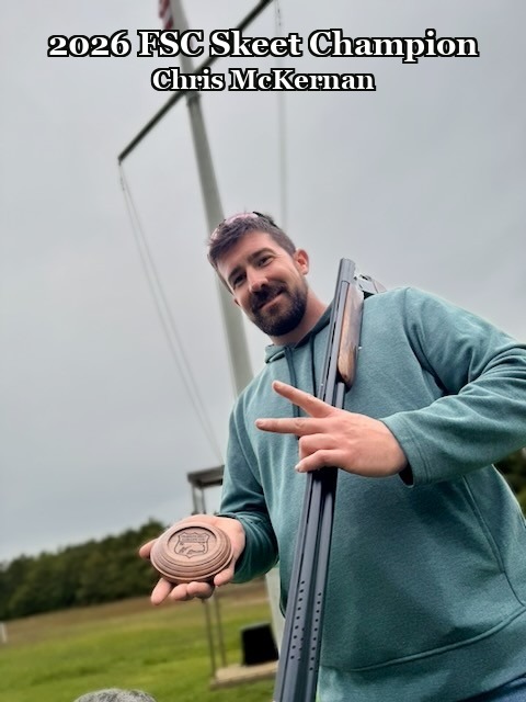 Chris McKernan, 2026 FSC Skeet Champion, holding his championship medallion
